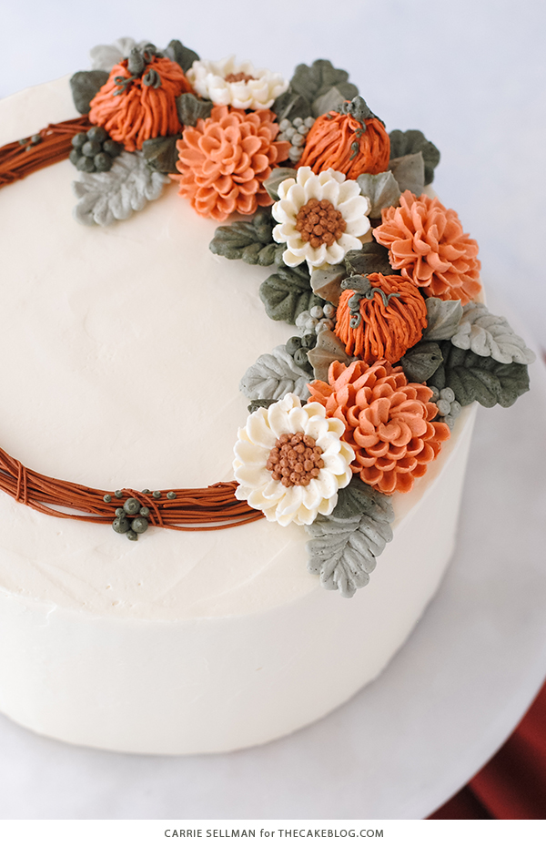 Pumpkin Spice Cake - moist pumpkin cake with cinnamon, ginger and nutmeg paired with pumpkin spice buttercream frosting | by Carrie Sellman for TheCakeBlog.com