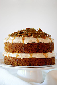Pumpkin Cake with cinnamon cream cheese frosting and pumpkin seed brittle topping | TheCakeBlog.com