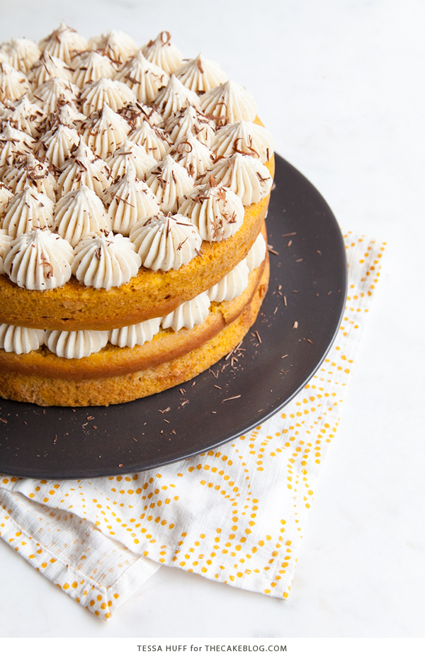 Pumpkin Tiramisu Cake - pumpkin spice cake soaked with coffee liqueur, fluffy mascarpone frosting and chocolate shavings | Tessa Huff for TheCakeBlog.com
