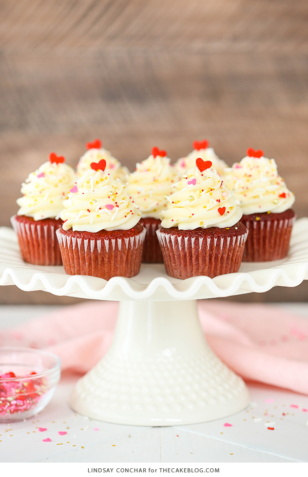 Red Velvet Cupcakes - super easy to make and stay moist for days, with a classic red velvet flavor and cream cheese frosting | Lindsay Conchar for TheCakeBlog.com