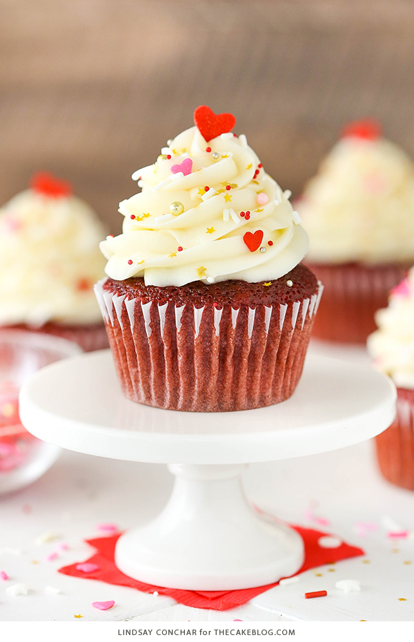 Red Velvet Cupcakes - super easy to make and stay moist for days, with a classic red velvet flavor and cream cheese frosting | Lindsay Conchar for TheCakeBlog.com