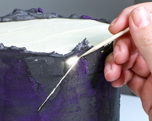 Spiderweb Cake - how to make an easy spiderweb cake with buttercream | by Erin Gardner for TheCakeBlog.com