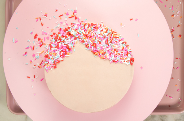 Sprinkle Girl Cake - how to make cute girly face cakes with sprinkles for the hair and chocolate heart sunglasses | by Erin Gardner for TheCakeBlog.com