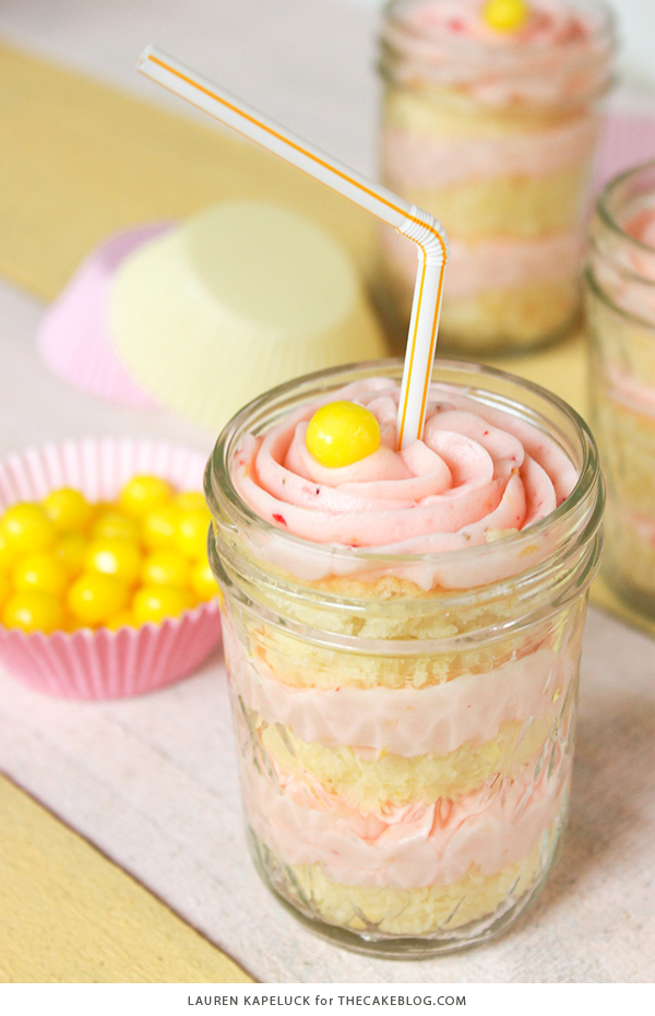 Strawberry Lemonade Cupcakes - moist lemon cupcakes paired with fresh strawberry buttercream for the perfect combination of sour and sweet | by Lauren Kapeluck for TheCakeBlog.com