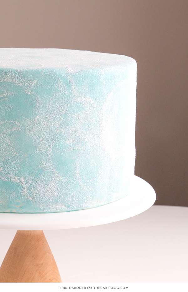 Sueded Buttercream Cake with Sprinkle Snowflakes | by Erin Gardner for TheCakeBlog.com #cake #winter #christmas #christmasdessert