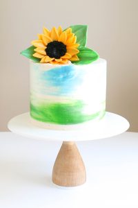 Sunflower Cake - how to make gorgeous sunflower cake decorations using melted chocolate | by Erin Gardner for TheCakeBlog.com